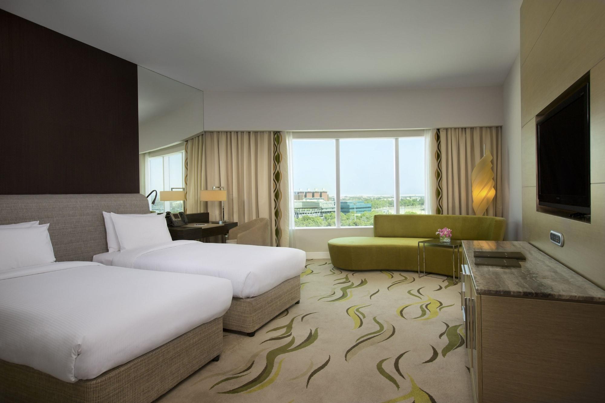 אבו דאבי Millennium Al Rawdah Hotel מראה חיצוני תמונה A room at the hotel