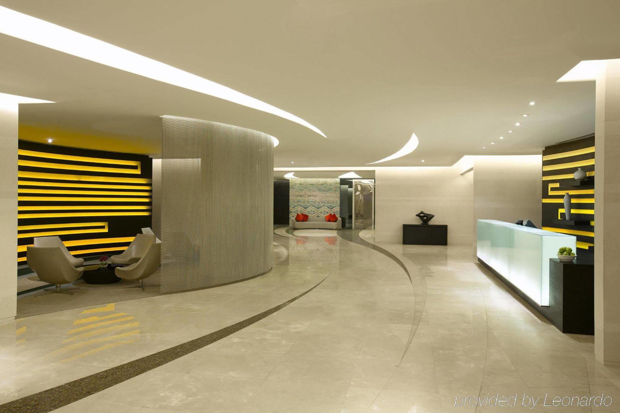 אבו דאבי Millennium Al Rawdah Hotel מראה חיצוני תמונה The reception area of the hotel